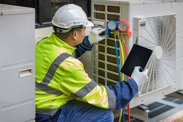 Professional Emergency Ac Repair technician working in Corinth, NY
